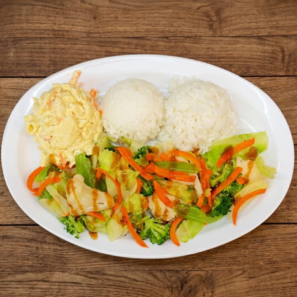 A white oval plate with macaroni salad, two scoops of rice, and stir-fried vegetables.